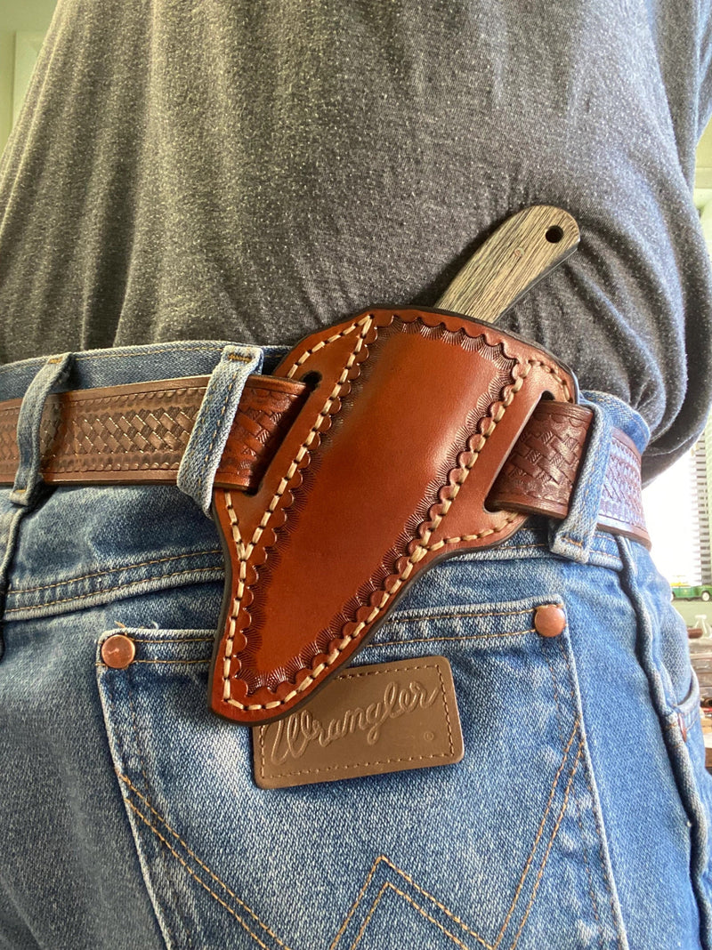 Custom handmade Western cowboy knife with rugged blade, traditional handle and durable sheath by Backcountry Blades